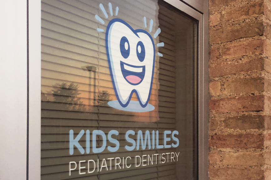 Logo on window collateral - Kids Smiles Branding by Gonzalo Peral